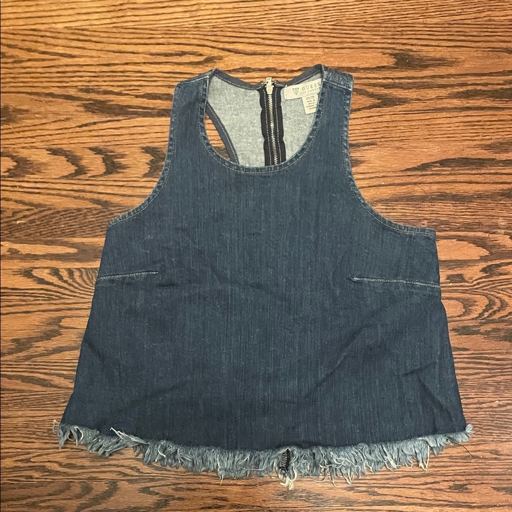 Guess women’s Blue Denim Tank Top size XS with zipper in back and frayed hem.